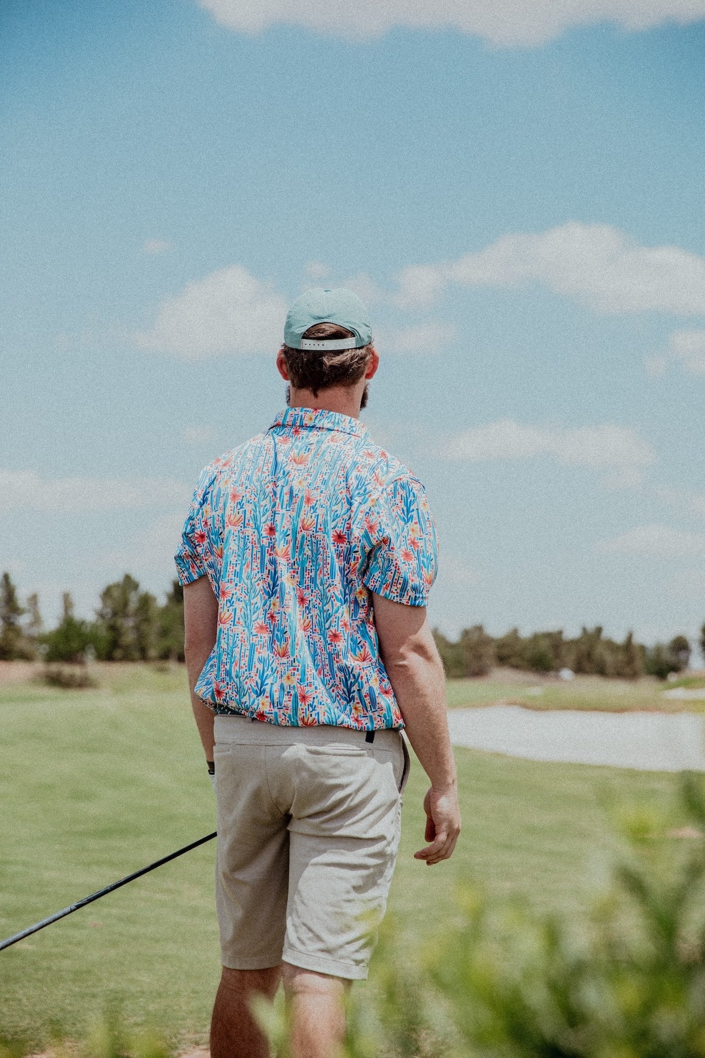 Mesa Mosaic: Geometric Floral Golf Polo